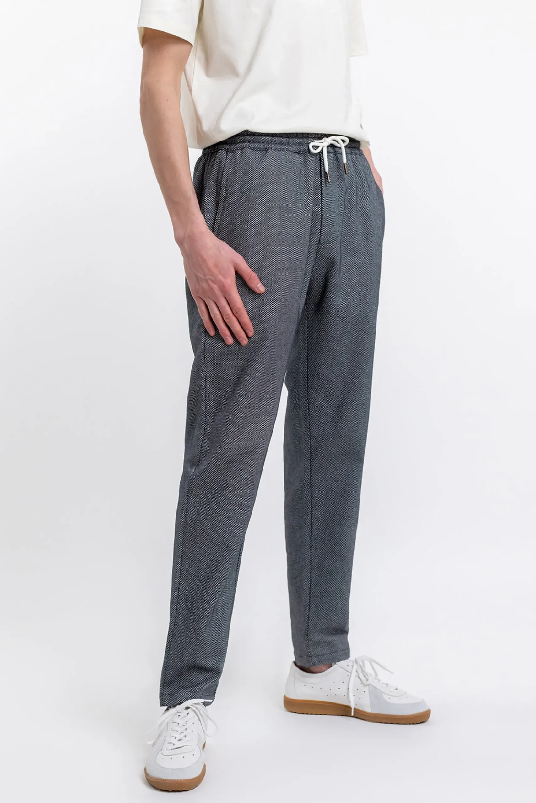 unisex_schwarz_karierte_f_0.webp Unisex Schwarz karierte Freizeithose